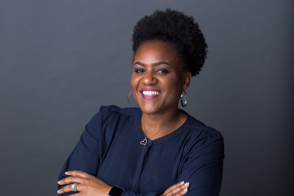 Business woman having her headshot taken in a photography studio