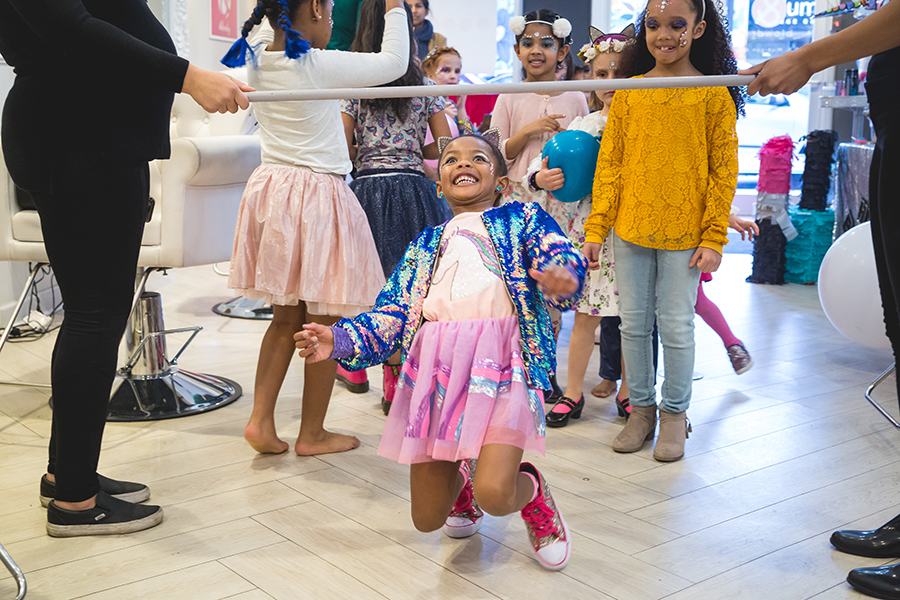 Limbo line at a party photographed by TK Photography