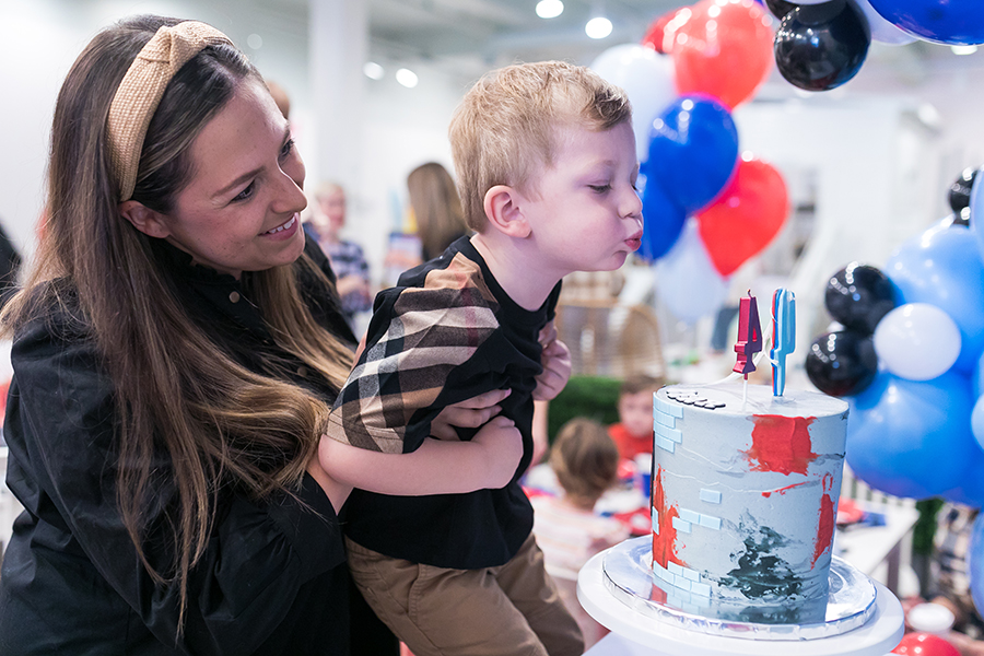 A mom and Birthday boy at a party photographed by TK Photography Chicago