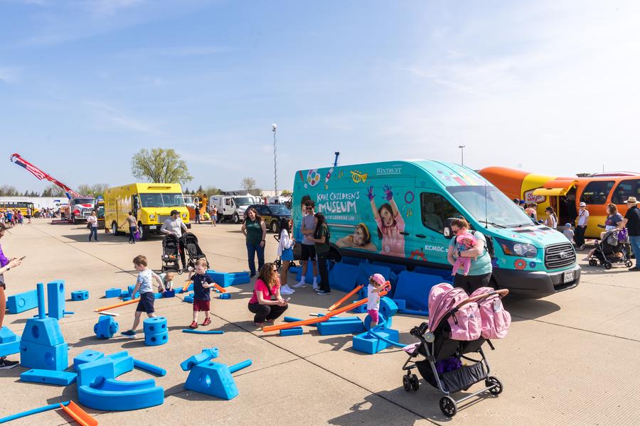 Vibrant Scene at the Kohl Children's Museum Touch a Truck Event