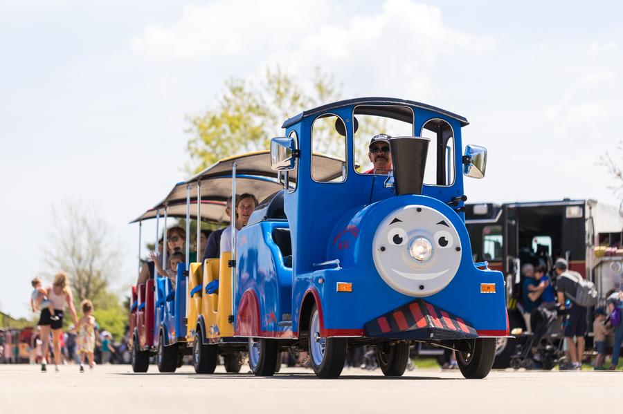 Kids Enjoying a Thomas the Tank Engine Train Car at Kohl Children's Museum's Touch a Truck Event