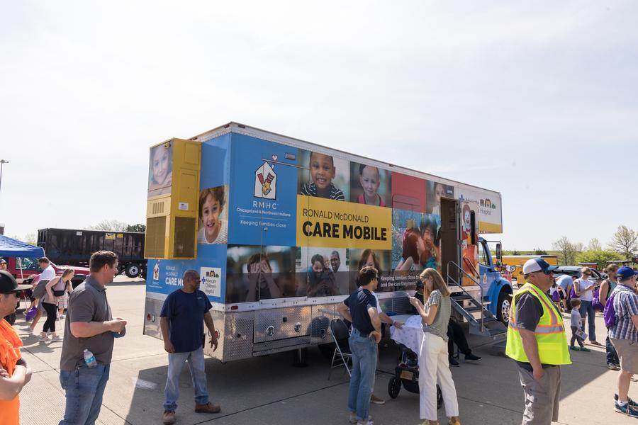 Families Engaging with Trucks at Kohl Children's Museum's Touch a Truck Event